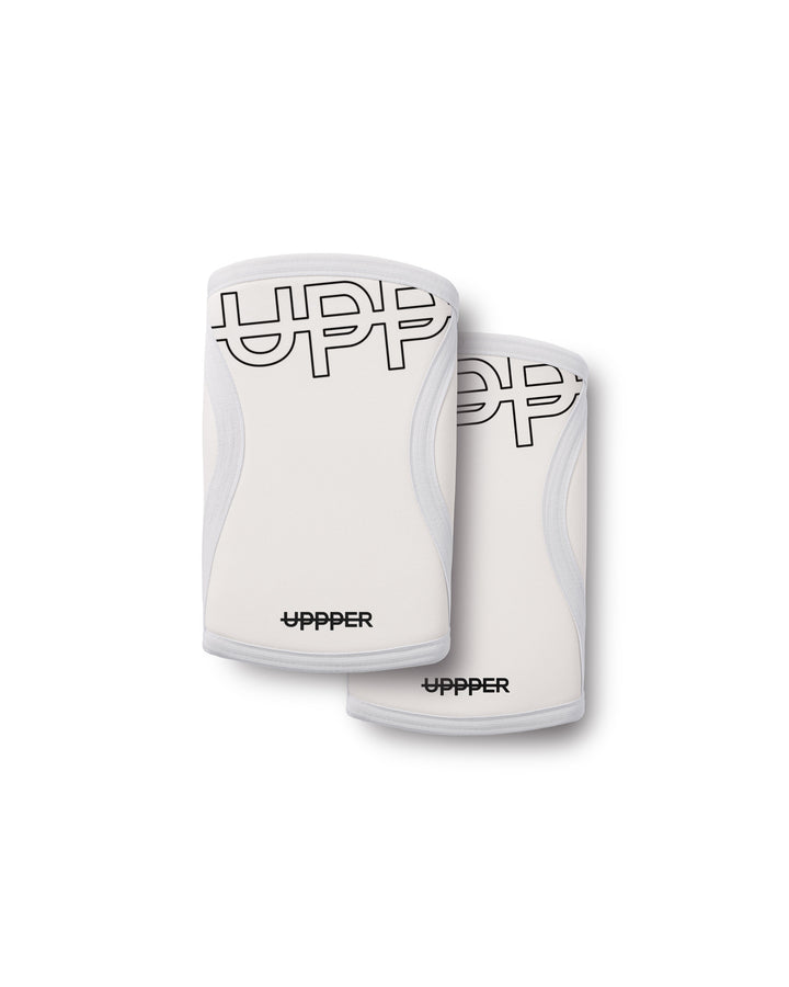 pair of white neoprene uppper knee sleeves with uppper logo on white background